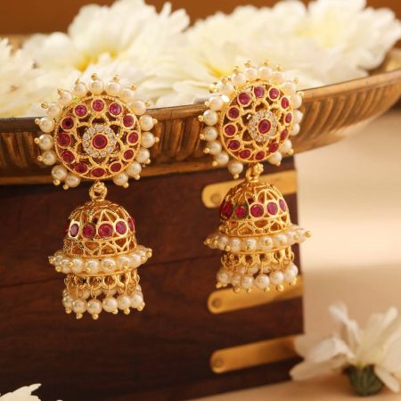 Gold jhumkas with pearls and pink stone accents
